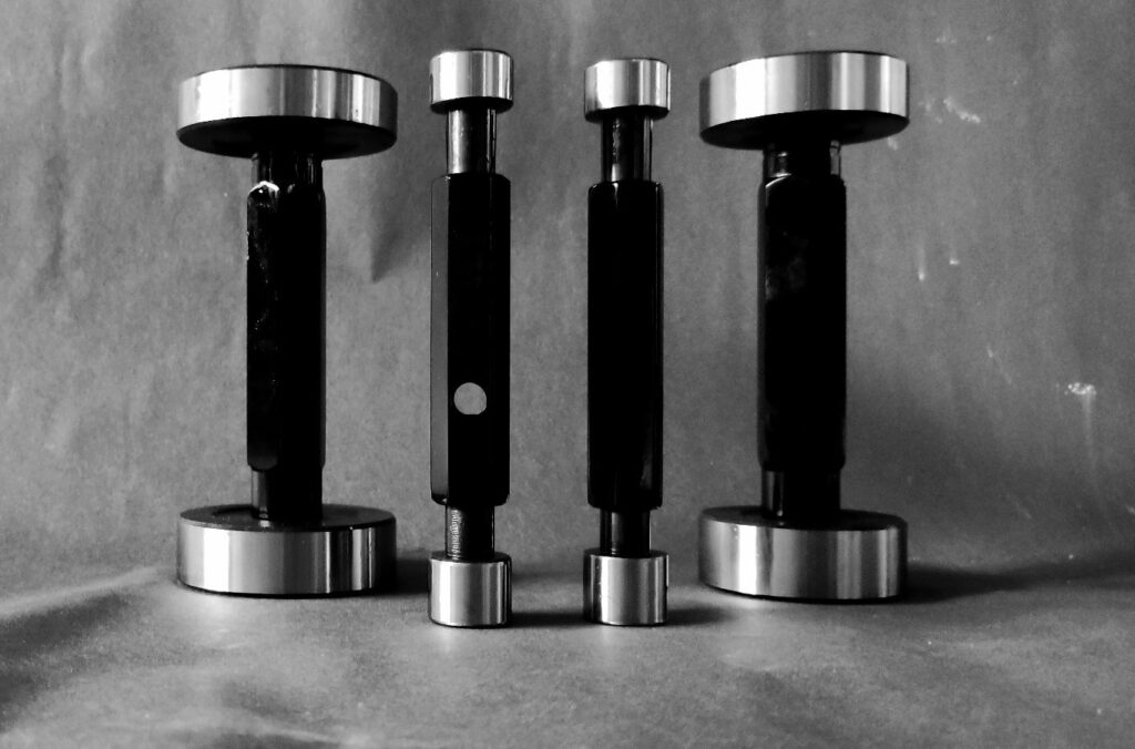 Plain plug gauge used for bore size verification in automotive and CNC components.